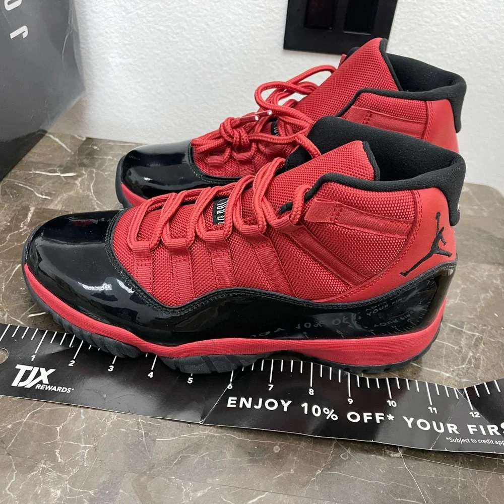 New! Unworn! Air Jordan 11 retro red and black men’s size 8